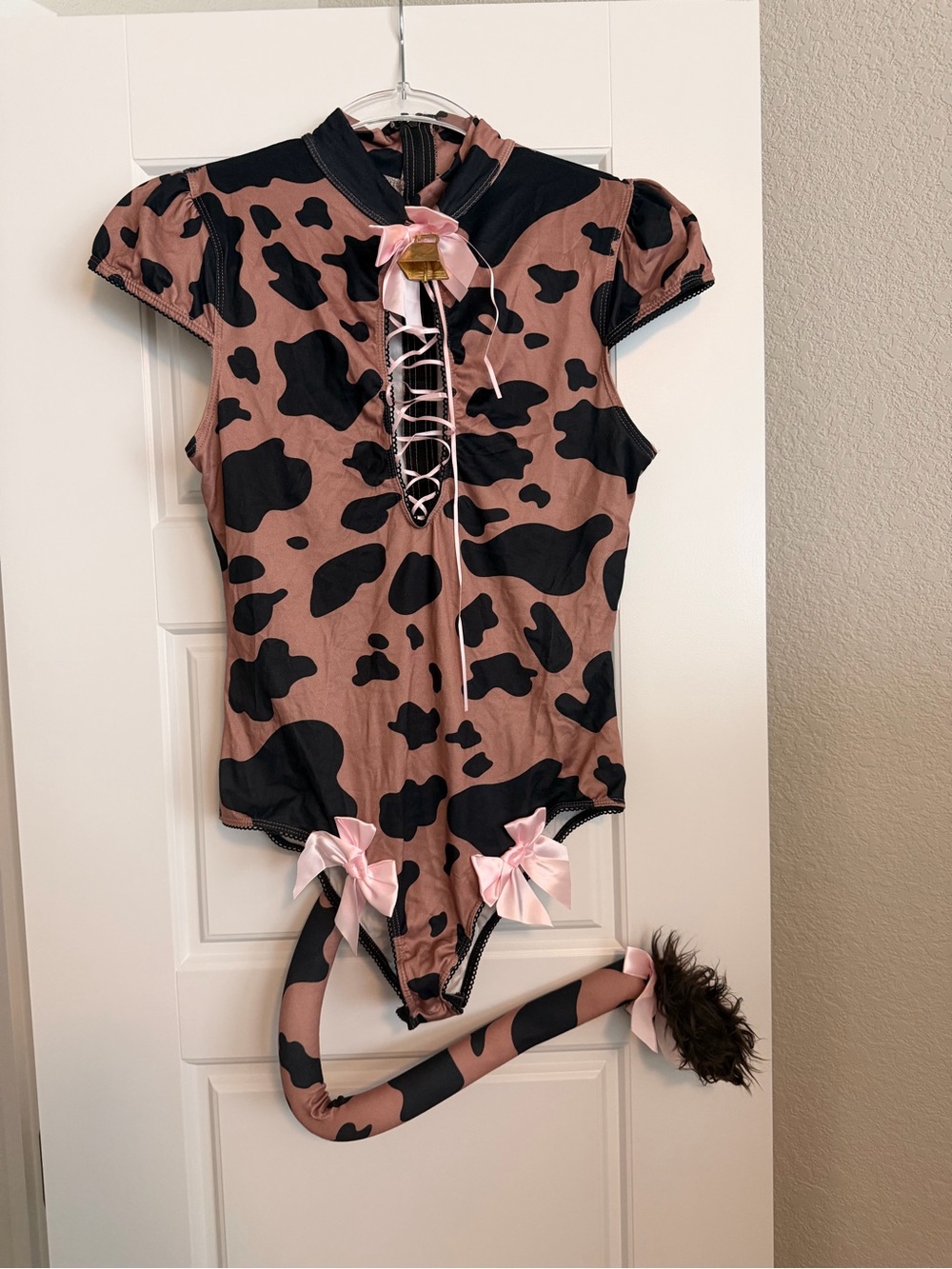 Dolls Kill Trickz N Treatz Cow Print Costume Onesie with Bag